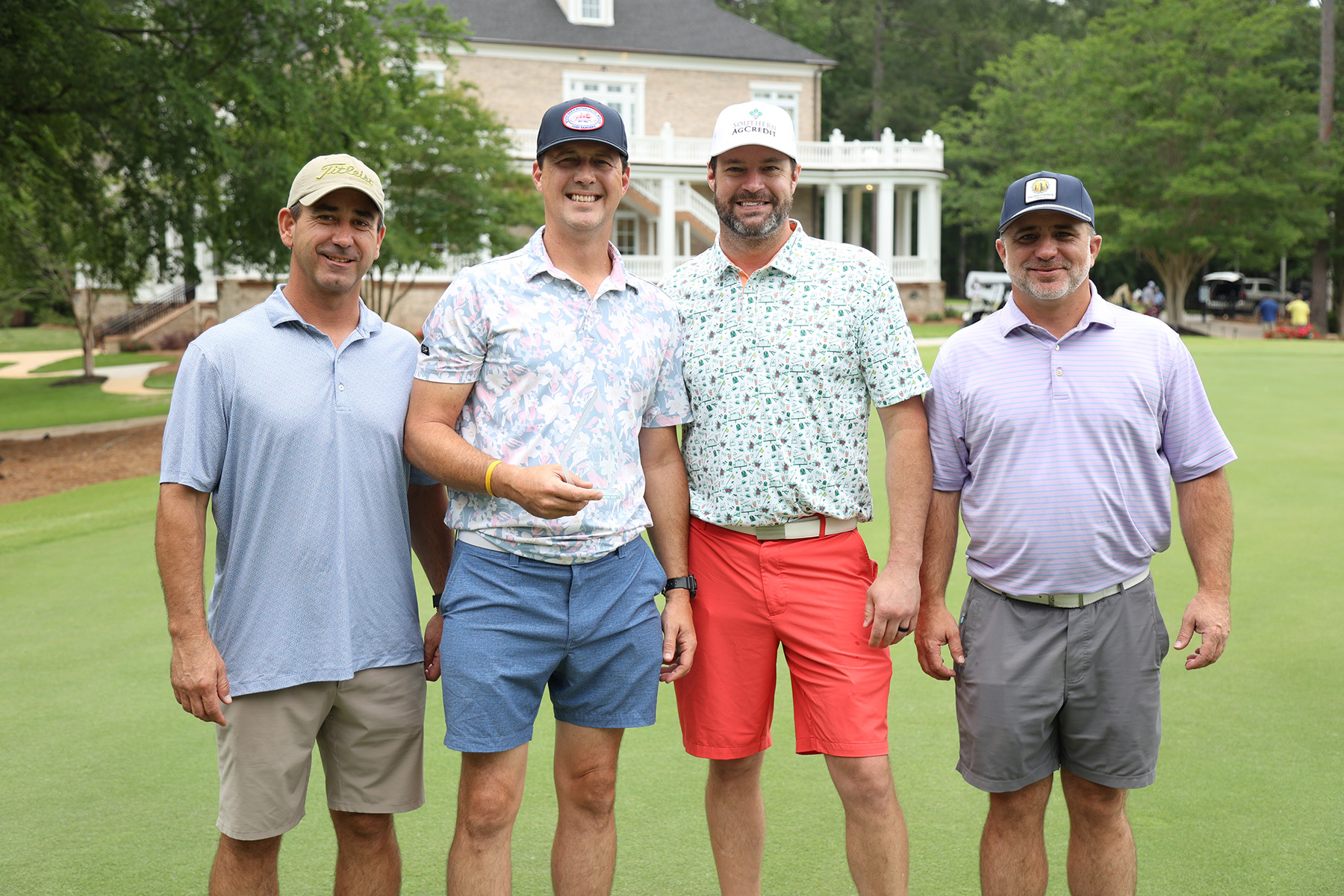 The team of (from left) Jason Mangum, Josh Sanders, Jody Blount, and Lake Thoms claimed the Championship Flight of the 22nd annual Warrior Golf Classic with a 22-under-par round of 50 over 18 holes. (EC Photo)